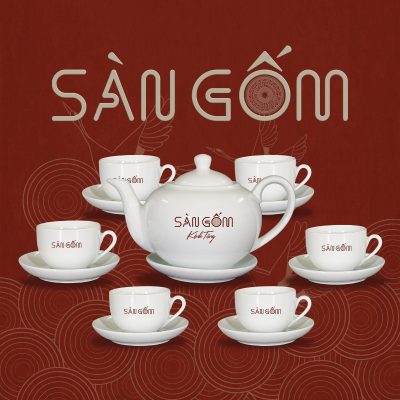am-chen-trang-su-bat-trang-in-logo-dang-giang-tay