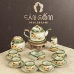 Bộ ấm chén màu ngà dáng chữ thậphọa tiết Hoa Mai SG-AC133