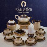 Bộ ấm chén hỏa biến dáng chuông quai rồng hoa vàng nở trong chén SG-AC204