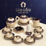 Bộ ấm chén hỏa biến quai rồng hoa vàng nở trong chén SG-AC215