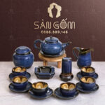 Bộ ấm chén vòi xoắn họa tiết hoa vàng nở trong chén SG-AC195
