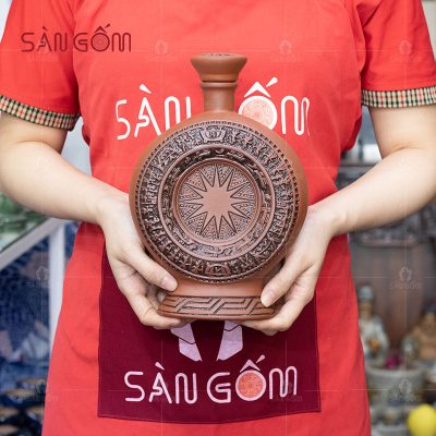 nam-ruou-trong-dong-dong-son-mt5