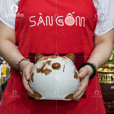 ong-heo-tiet-kiem-heo-ve-hoa-trang-nau-4