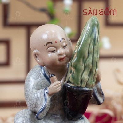 tuong-chu-tieu-nho-om-chau-cay-men-ran-bat-trang (1)