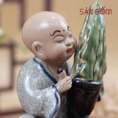 tuong-chu-tieu-nho-om-chau-cay-men-ran-bat-trang (2)