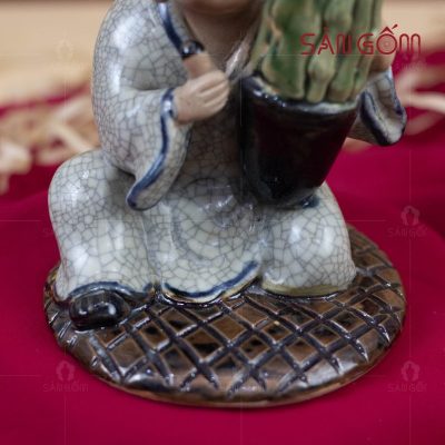 tuong-chu-tieu-nho-om-chau-cay-men-ran-bat-trang (3)
