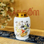 Hộp đựng trà màu trắng dáng trụ vẽ họa tiết chim công SG-BĐT31