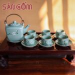 Bộ ấm chén quai đồng men xanh họa tiết đào trắng SG-AC326