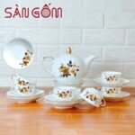 Bộ ấm chén sứ trắng kẻ chỉ vàng họa tiết bó lá màu vàng ngà SG-AC336